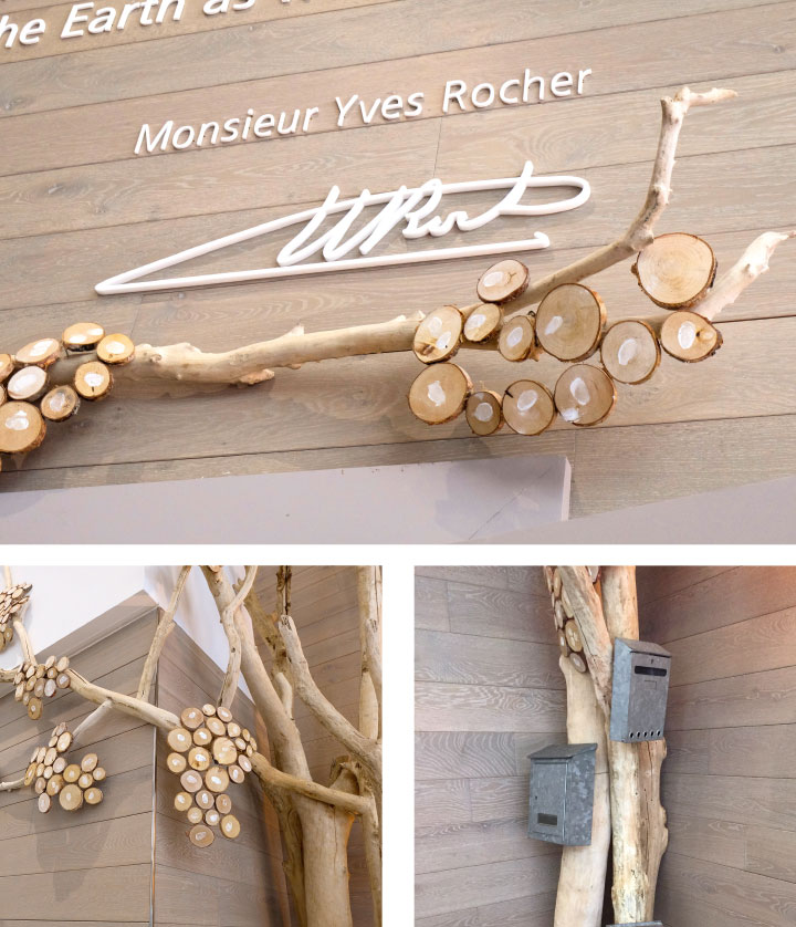 Une branche de l'arbre sous la signature de monsieur Yves Rocher fondateur de la marque